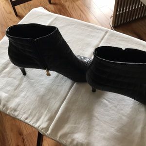 Black Chanel ankle boots with pearl on pull